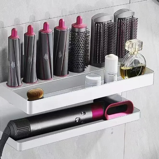 White punch-free double-layer aluminium rack holding Marcel waving irons on a bathroom wall.