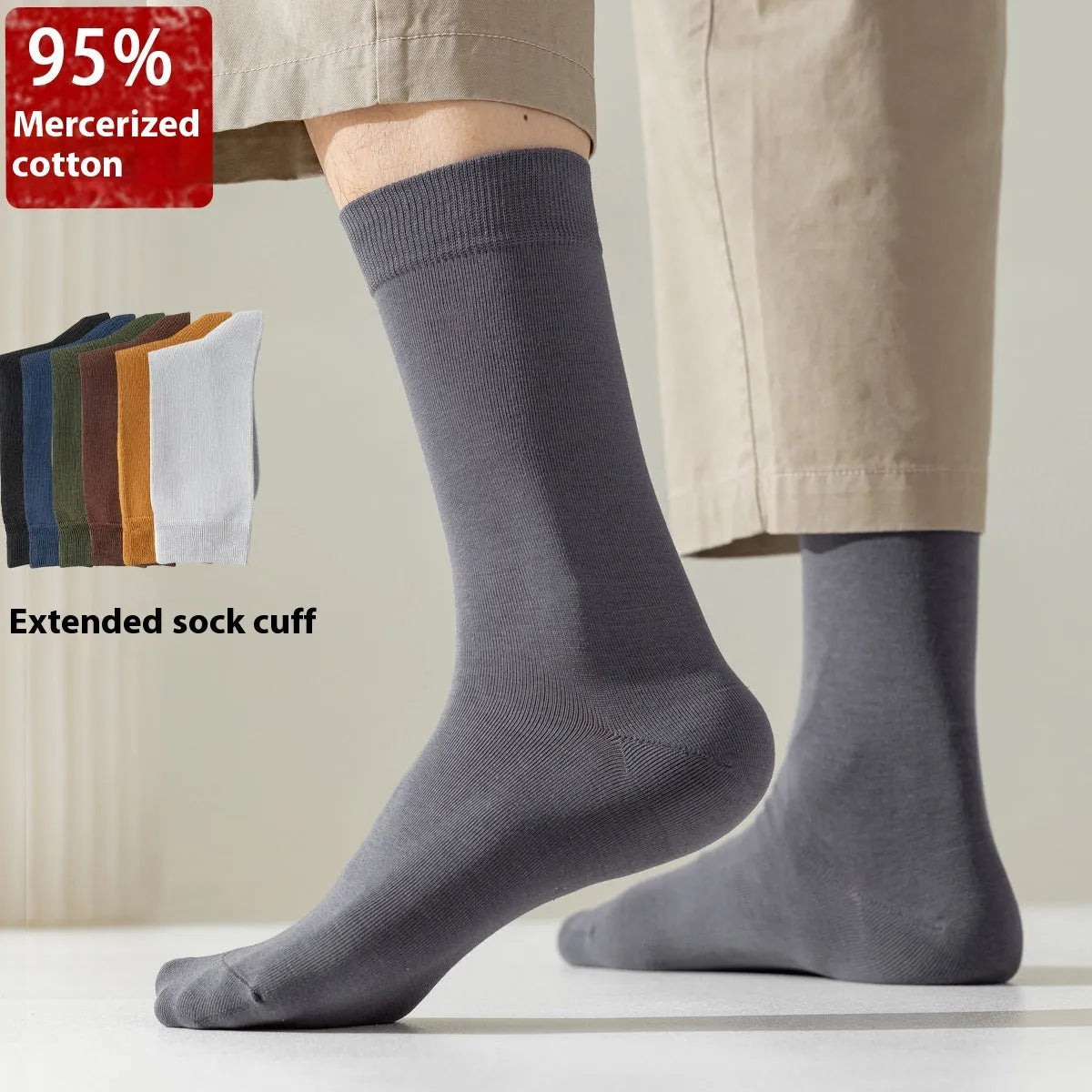 A pair of men's solid colour mid-calf socks made from combed cotton, shown in a light grey hue.