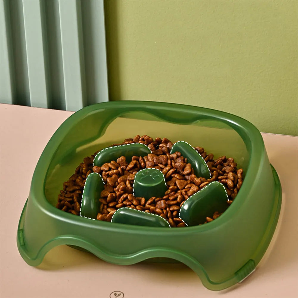 Blue plastic slow feeder dog bowl with internal maze pattern for portion control.
