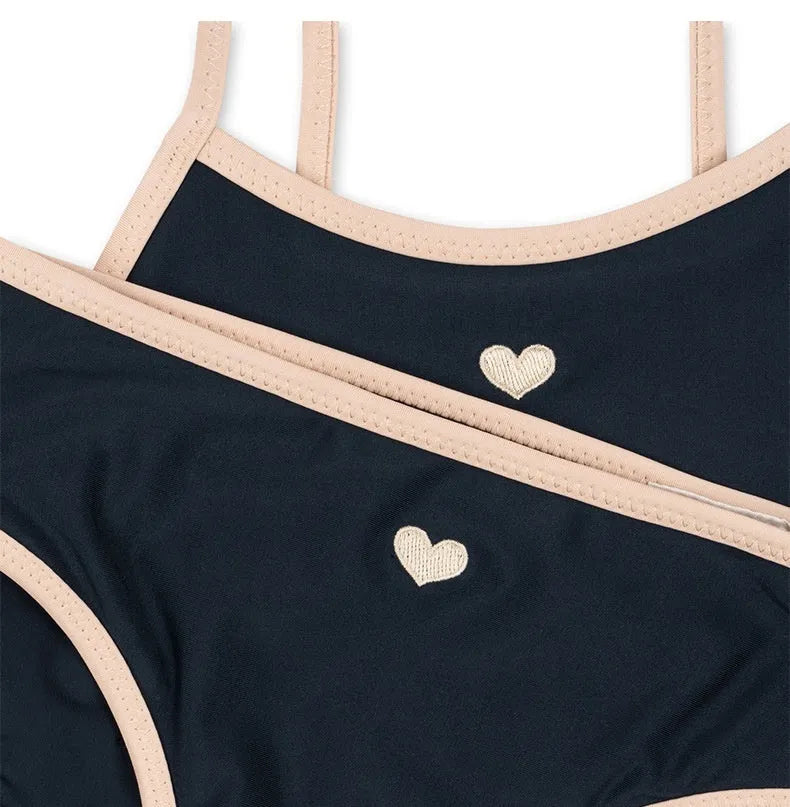 Dark blue baby split swimsuit for girls with high elasticity lycra lining, sizes 90cm to 130cm.