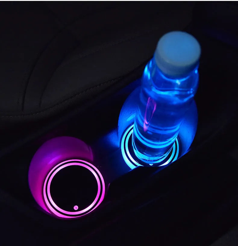 LED light-up car coaster showing seven colour options in automotive cup holder
