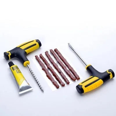 Vacuum tyre repair tool kit with black and yellow components for car and motorcycle puncture repairs
