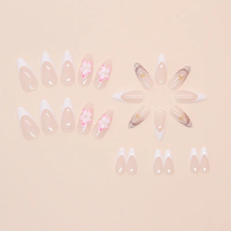 French style false nails with simple white flower and rock pattern design on a pink background, colour W1764.