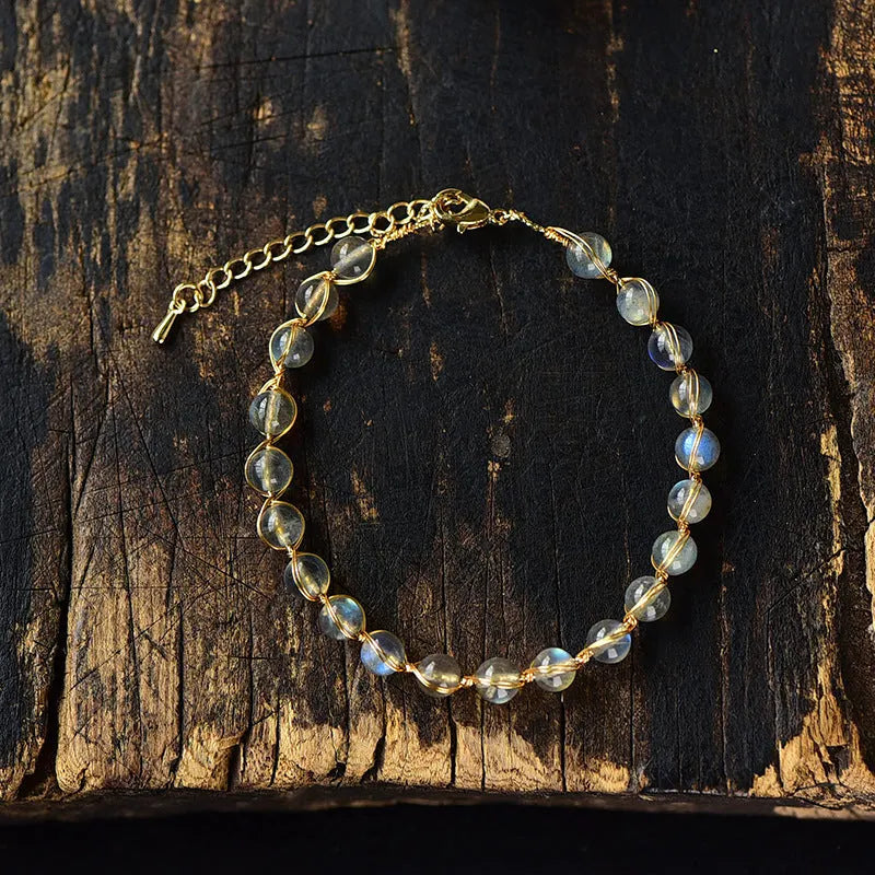 14K gilded women's bracelet with 6mm blue moonstone centrepiece and starry sky metal detailing