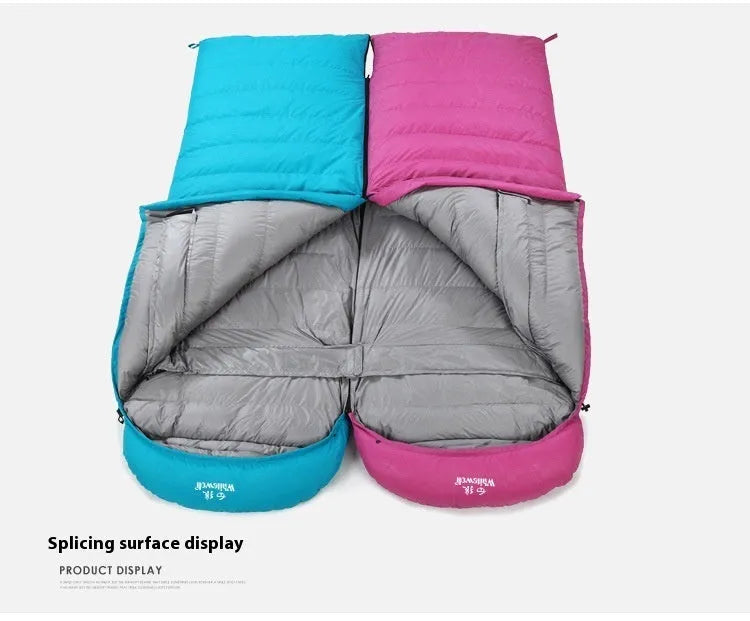 Black adult sleeping bag with envelope design, filled with white goose down and a tear-resistant nylon shell.