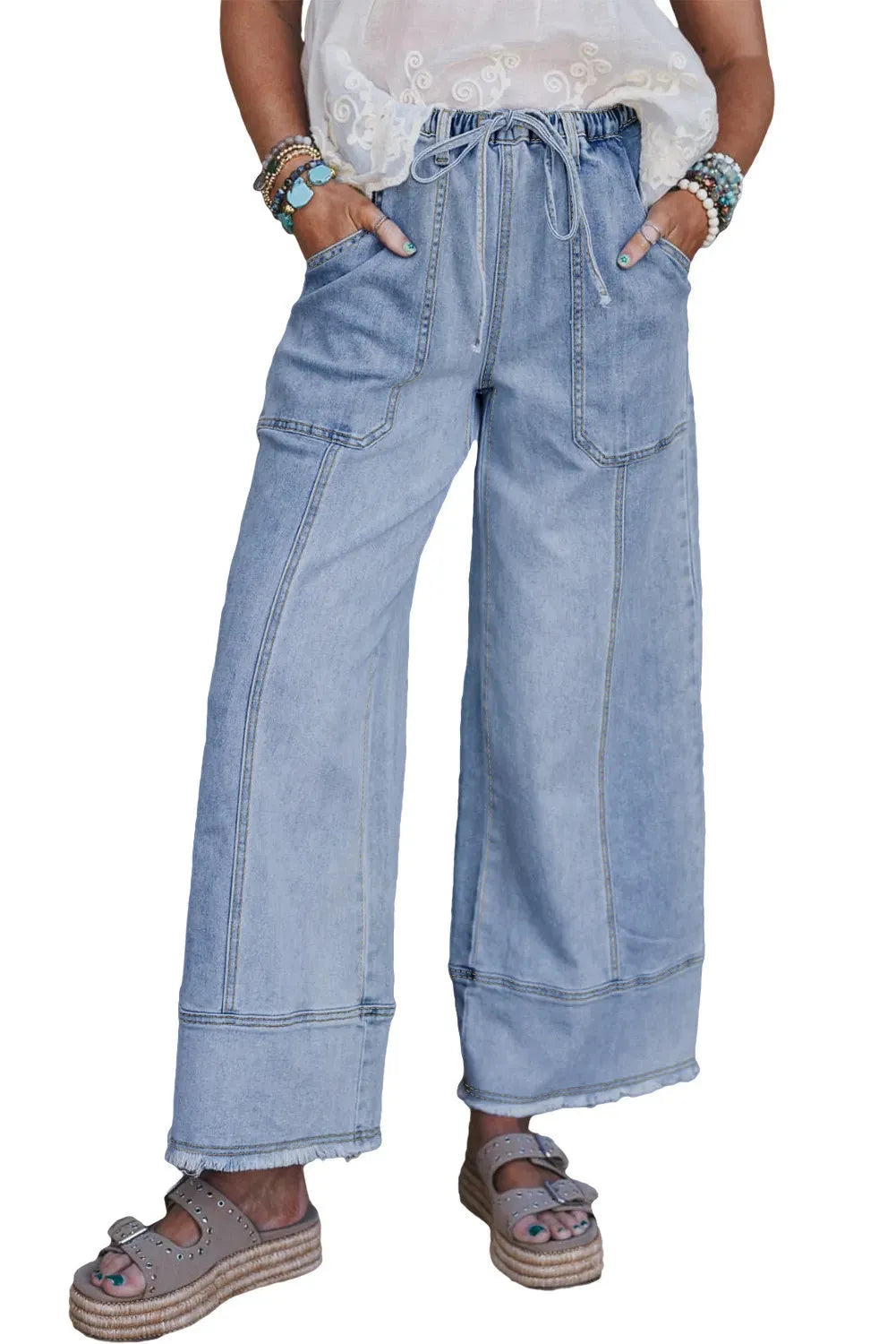 Beau blue wide leg denim trousers with drawstring waistband and raw hem finish