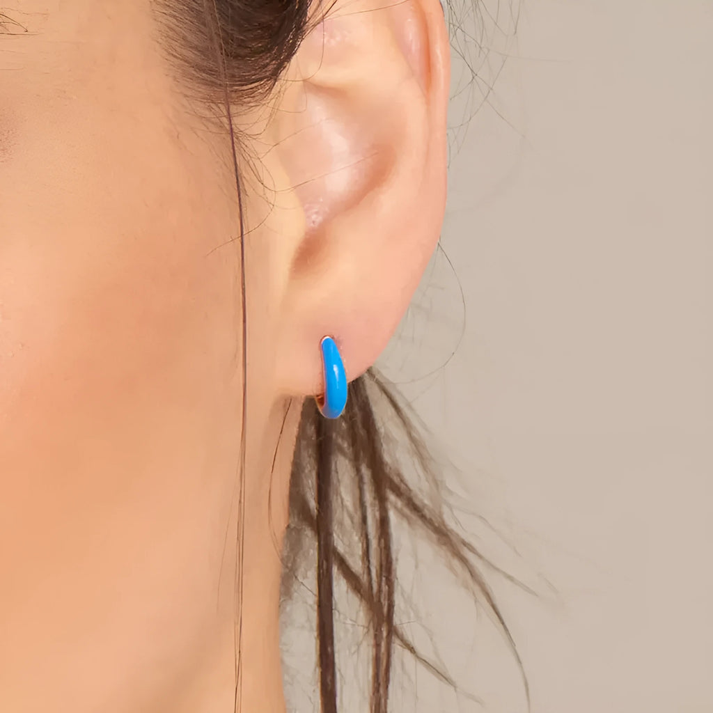 Curved oval epoxy drop earrings in multiple colours with silver needle posts and geometric U-shaped design