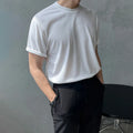 Cotton half sleeve t-shirt for men in slim fit available in black and white solid colours