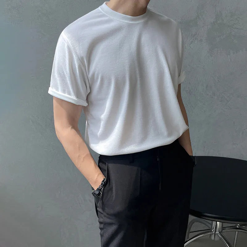 Cotton half sleeve t-shirt for men in slim fit available in black and white solid colours