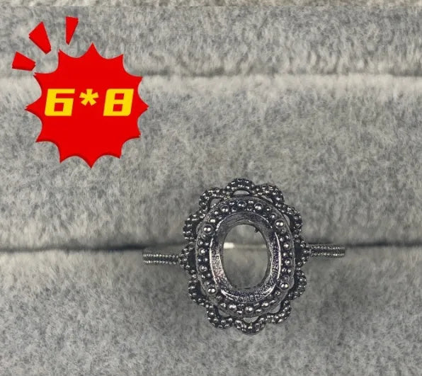 Oval denier ring with open mouth design, 6x8mm main stone and five-pointed star decoration