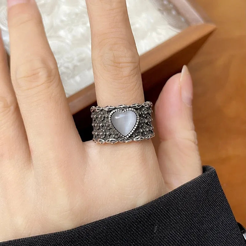Retro wide-faced adjustable heart ring in white copper plated silver with open design