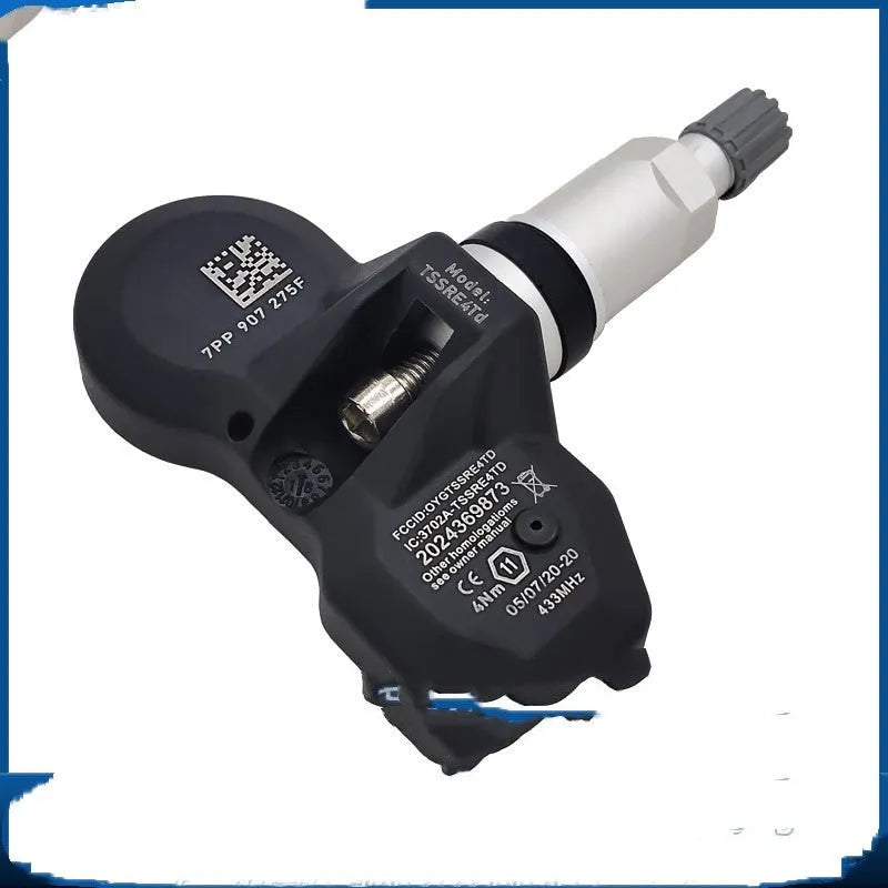Black tyre pressure monitor sensor unit for Audi vehicles with wireless monitoring capability