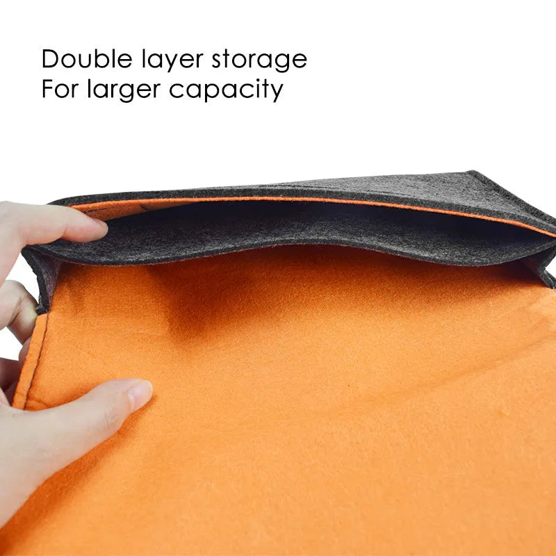 Black felt Nintendo Switch pouch case with game card slots and double layer storage compartments