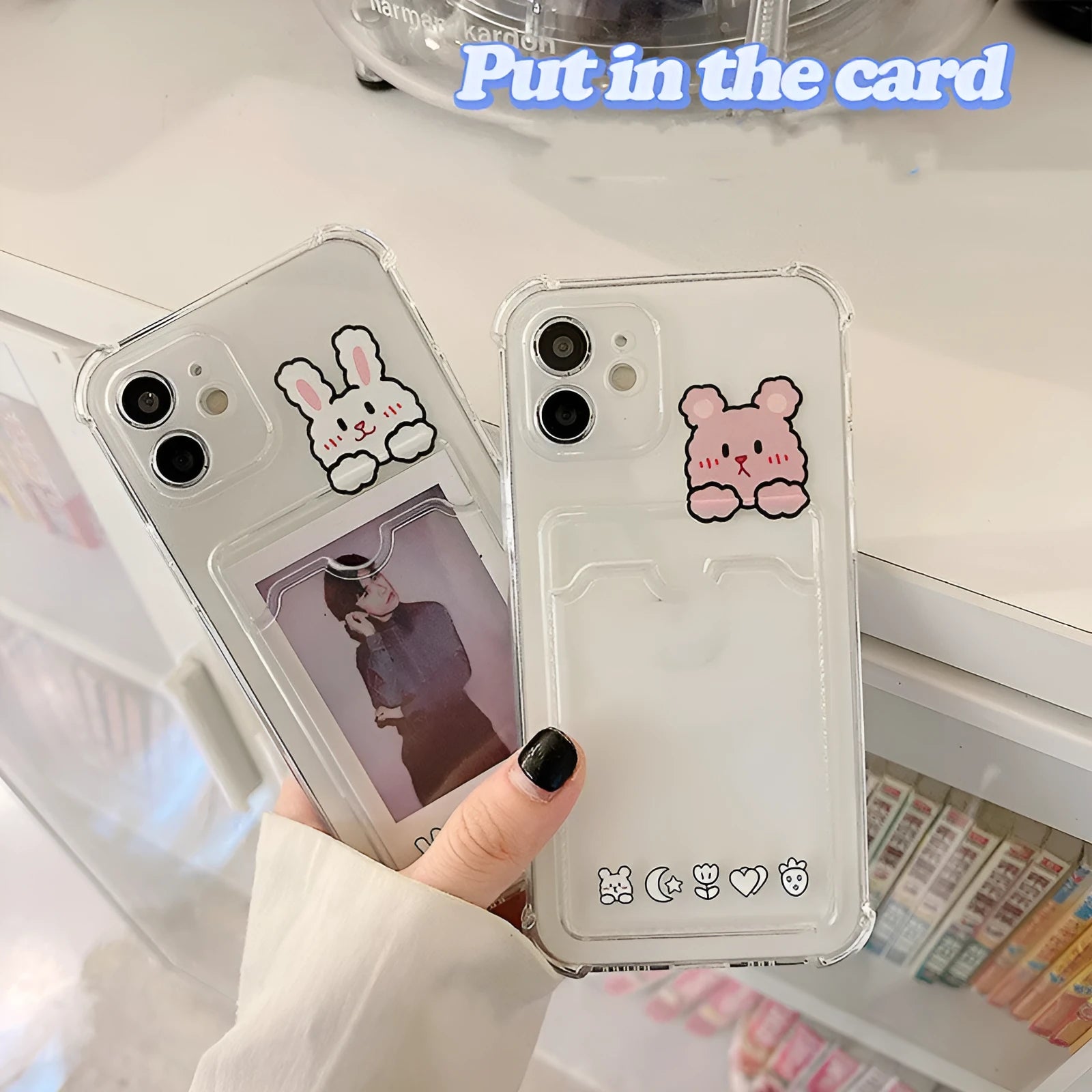 Clear cartoon printed iPhone case with card holder slot on the back.
