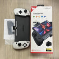Black or white portable Switch gamepad handle showing console insertion point, buttons, and Type-C charging port.