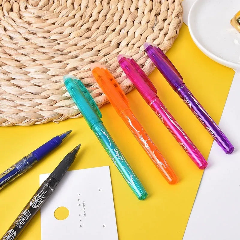 Set of heat-erasable gel pens in multiple colours with plastic bodies and stainless steel tips, showing 0.5mm and 0.7mm nib options.