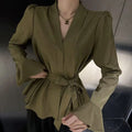 Women's French-style irregular collar shirt with long bell sleeves and tied front detail in polyester fabric