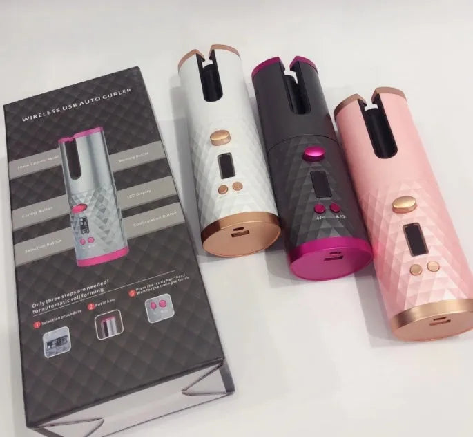 White portable USB wireless curling iron with a gold ceramic barrel and digital temperature display.