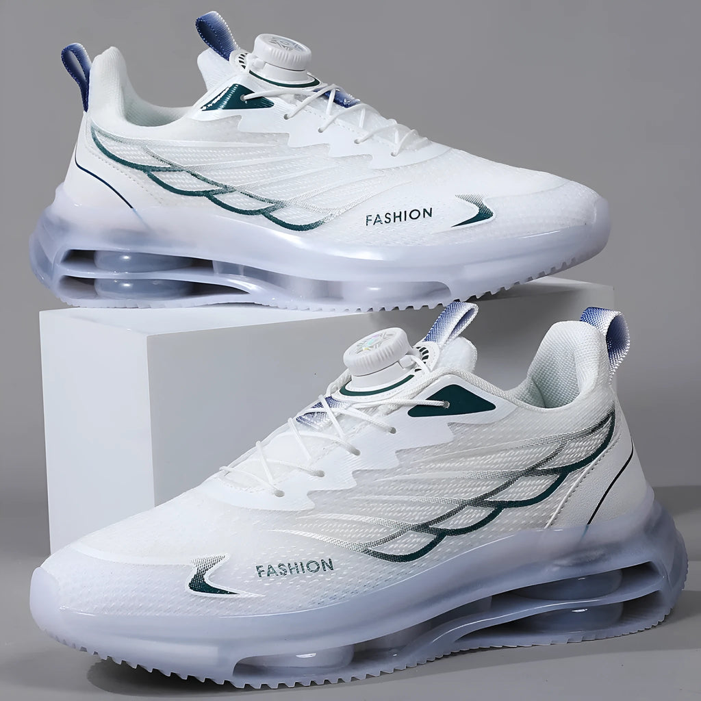 White low-top casual sports shoes with rotating button lace-up and mesh upper on a rubber sole.