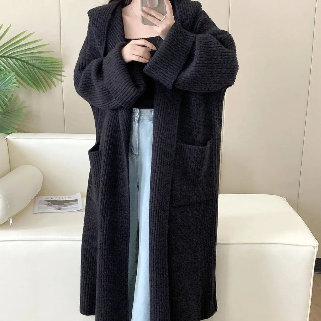 Women's loose hooded cardigan coat in acrylic fibre with 80cm length and raglan sleeves