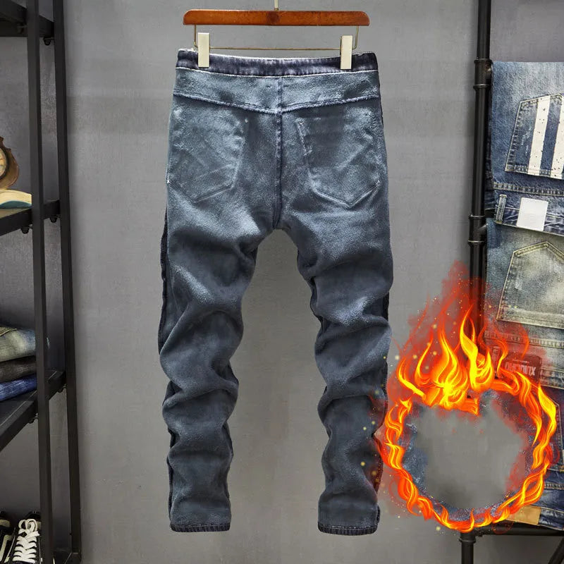 Men's dark blue skinny jeans with a slim fit, shown on a model.