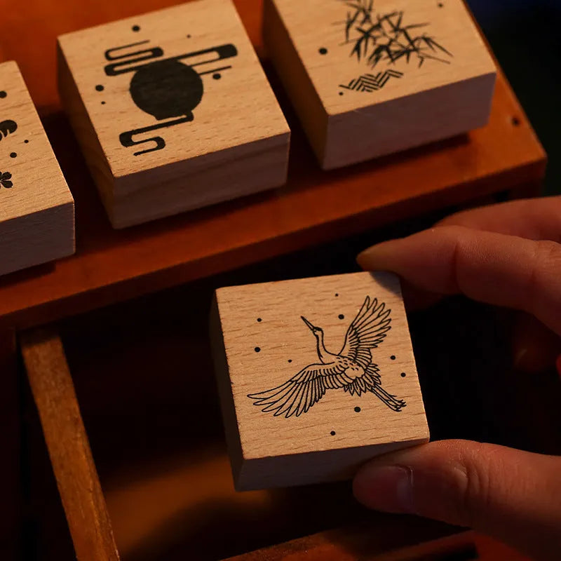Mr. Paper wooden seal set with traditional crane designs in four colour variations for DIY printing projects