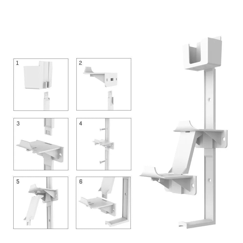 White adhesive wall hook holding a game controller and headphones