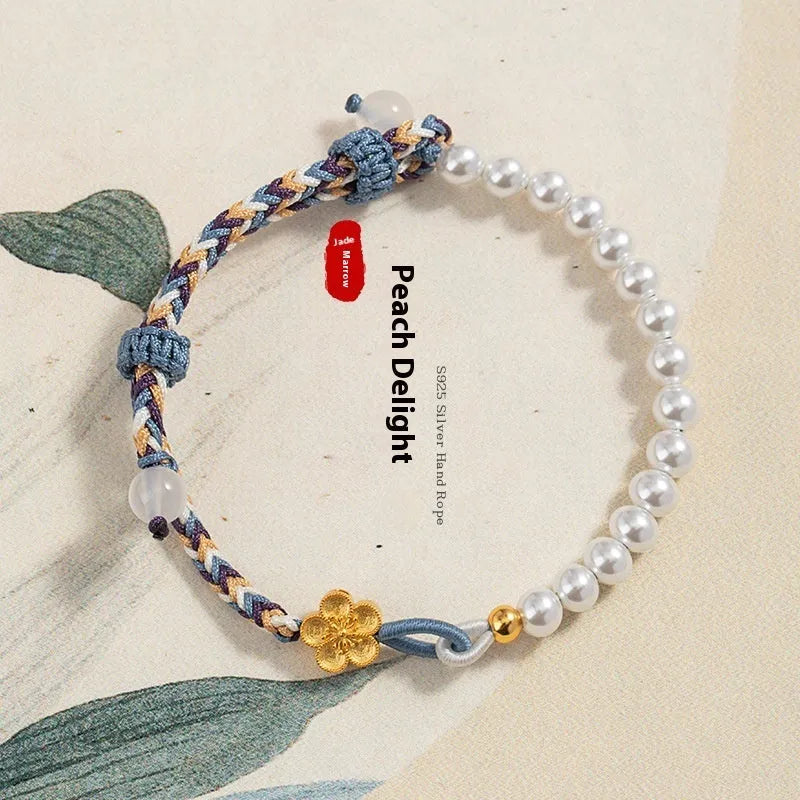 Peach-coloured Chinese flower weaving carrying strap with pearl accents on cord material