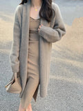 Women's knitted V-neck cardigan in khaki colour with medium length and loose fit