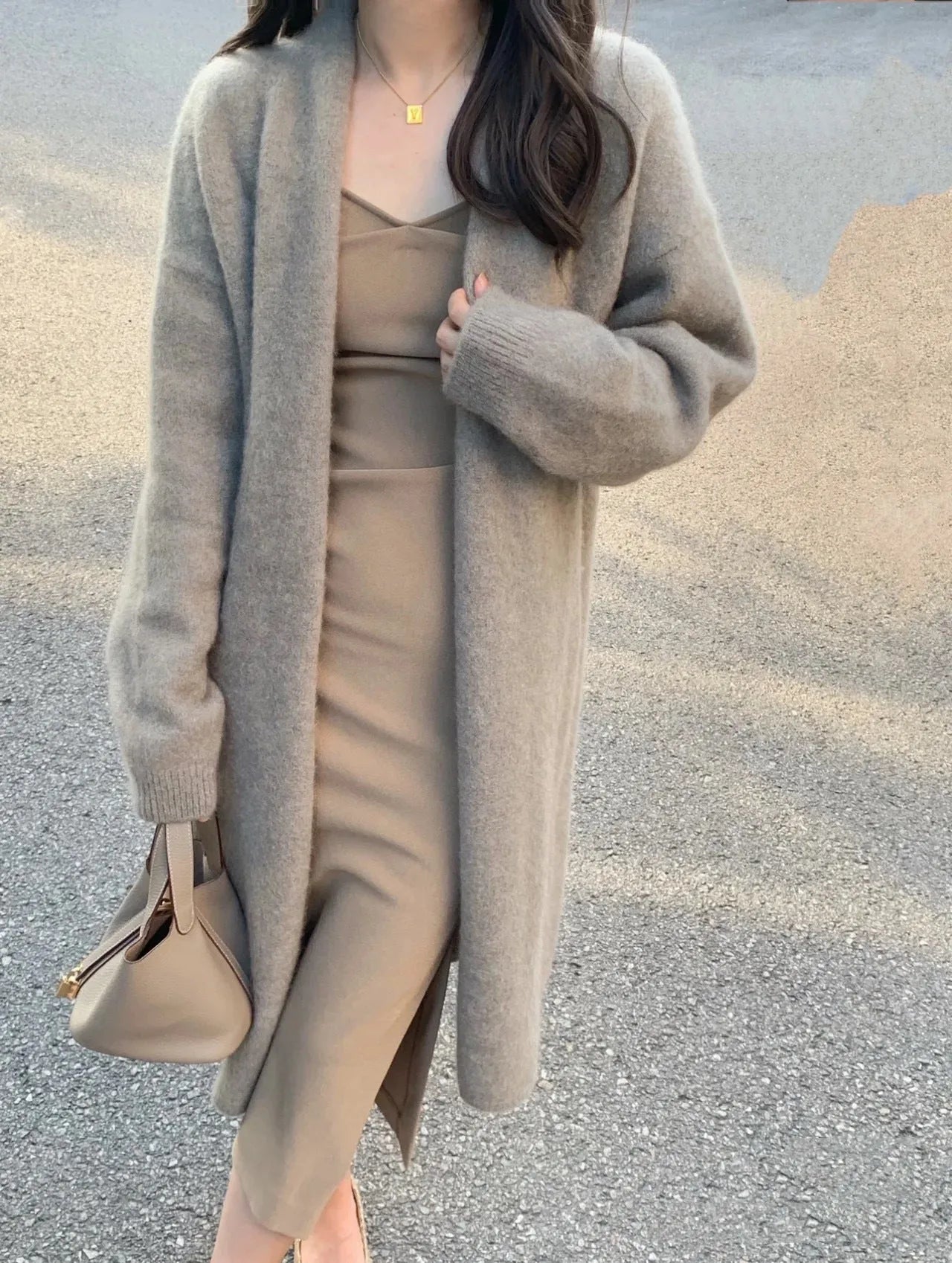 Women's knitted V-neck cardigan in khaki colour with medium length and loose fit