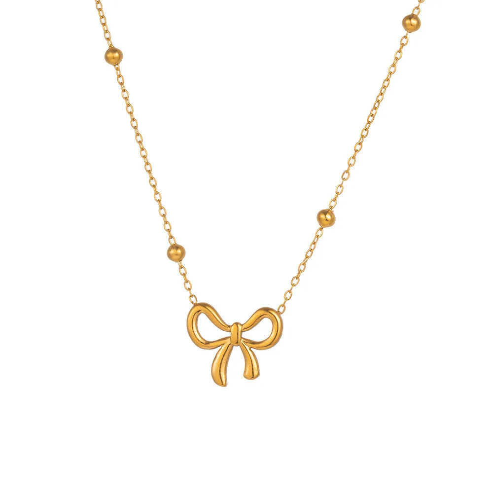 Gold bow necklace for women with cross chain design and adjustable length