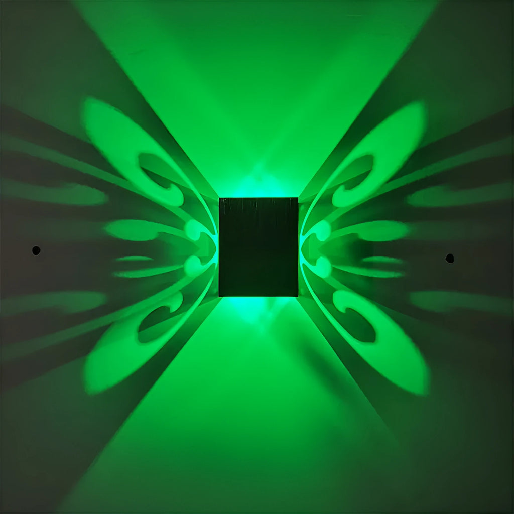 Modern butterfly-shaped aluminium LED wall lamp with colour-changing remote.