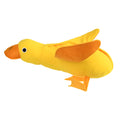 Yellow teddy dog toy with central duck doll, featuring a squeaker and treat leak compartment.