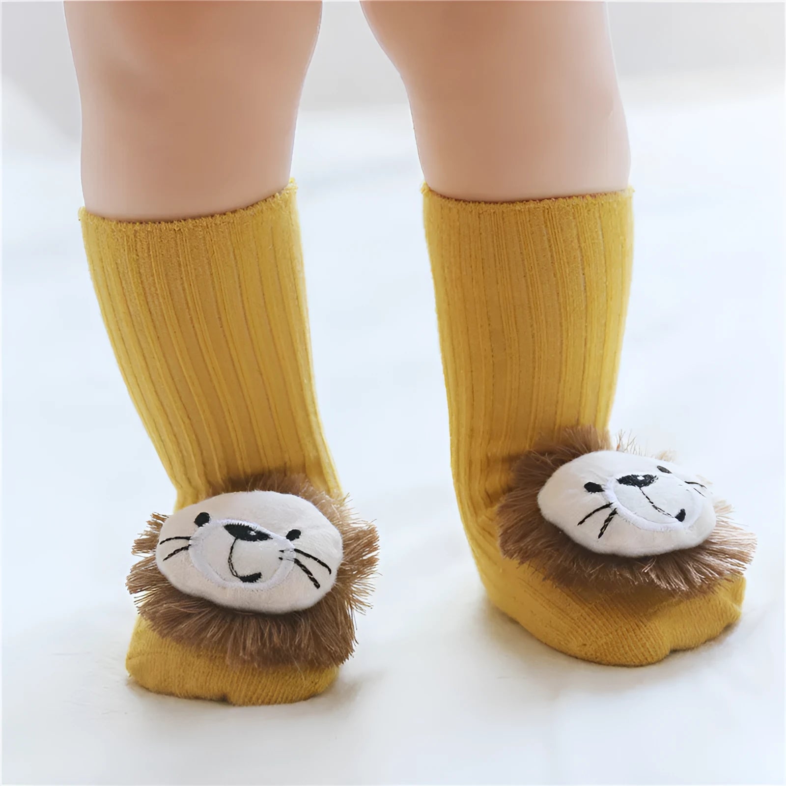 Cotton baby socks in multiple designs including animal prints, available in sizes XS, S, M for ages 0-6 months to 3 years