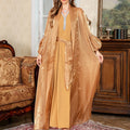 Blue Arabic style two-piece dress with long sleeves, long skirt, and rhinestone decoration.