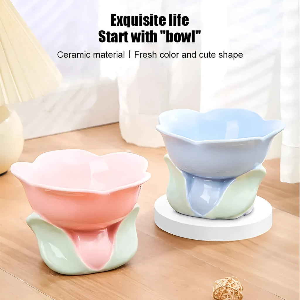 Blue ceramic elevated pet bowl with floral pattern and non-slip base for cats and small dogs