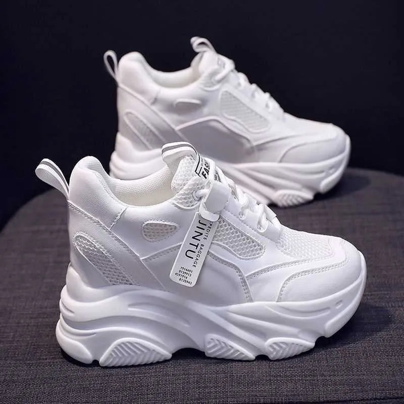 Women's black platform casual shoes with mesh upper, hollow-out design, and a velvet lining.