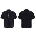 Men's black loose fit polo shirt with square collar and short sleeves.