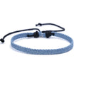 National style denim fabric bracelet carrying strap showing mixed material construction and wristband design