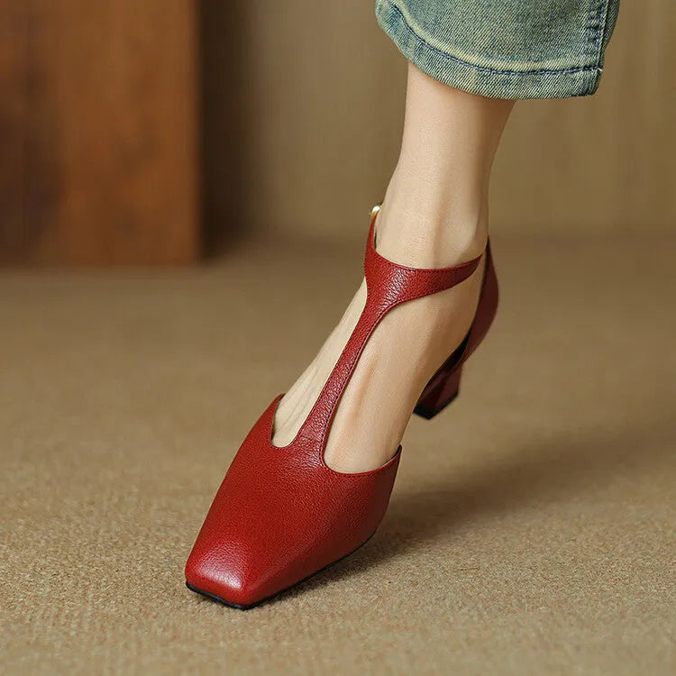 Wine red women's high heels with a square toe, chunky heel, buckle fastening, and visible stitching.