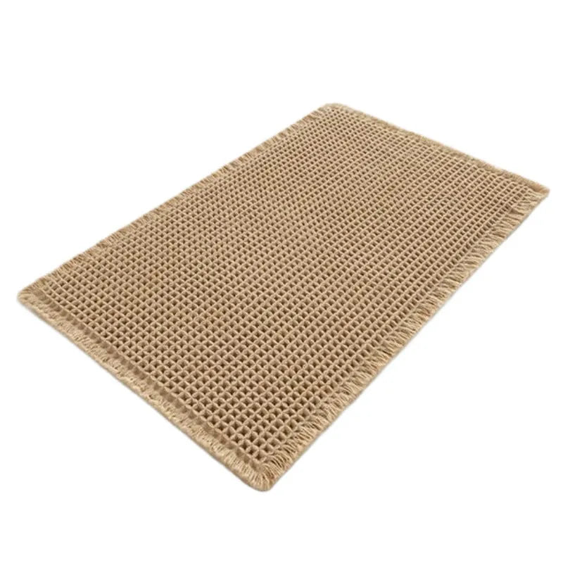 A checkered pattern polyester bathroom floor carpet showing non-slip backing.