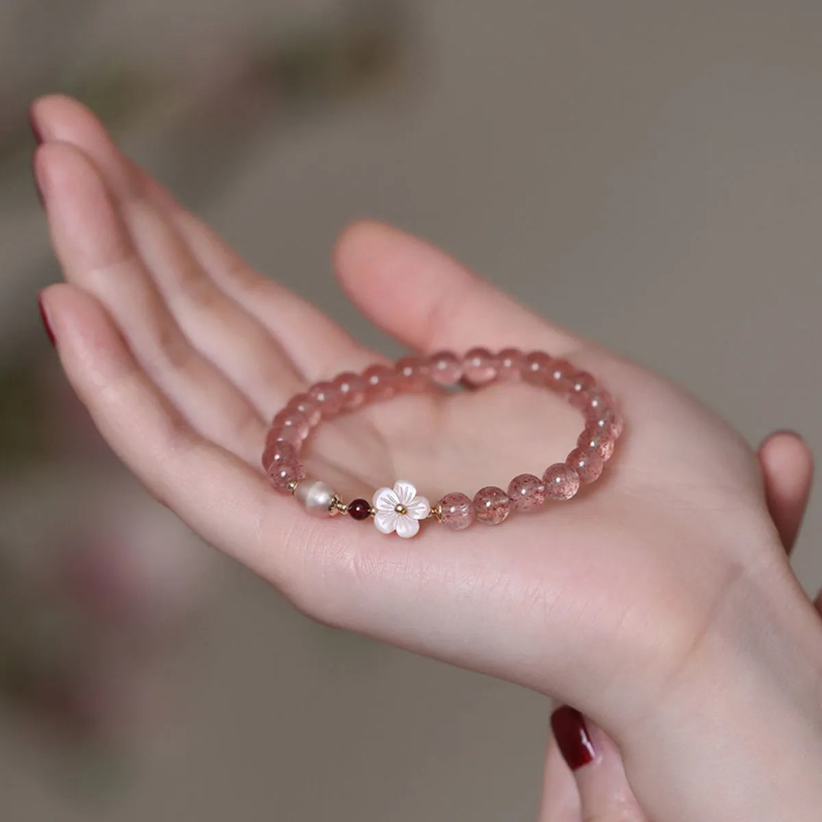 Strawberry quartz crystal bracelet with peach blossom floral design for women