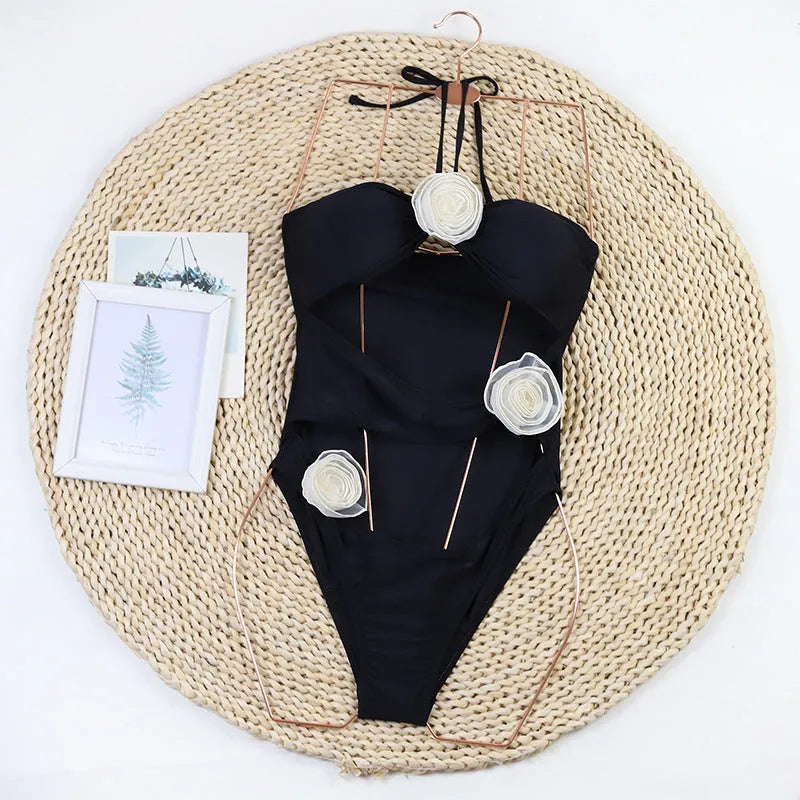 Women's black and blue stripes one-piece swimsuit with 3D flower pattern
