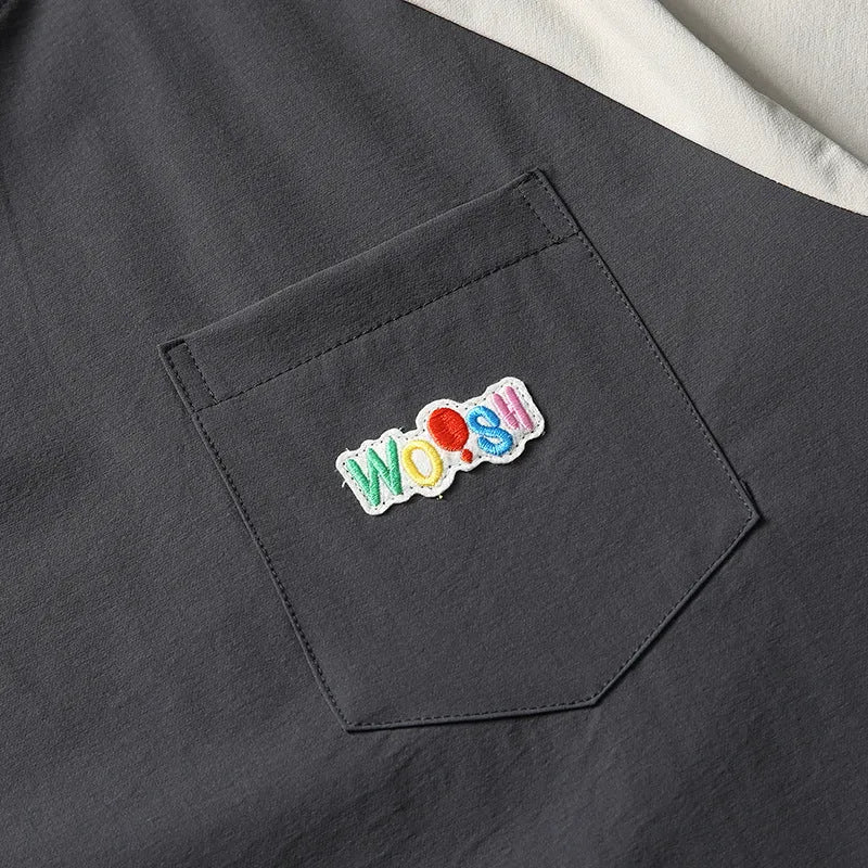 Dark grey men's t-shirt with contrasting raglan sleeves and a loose fit.