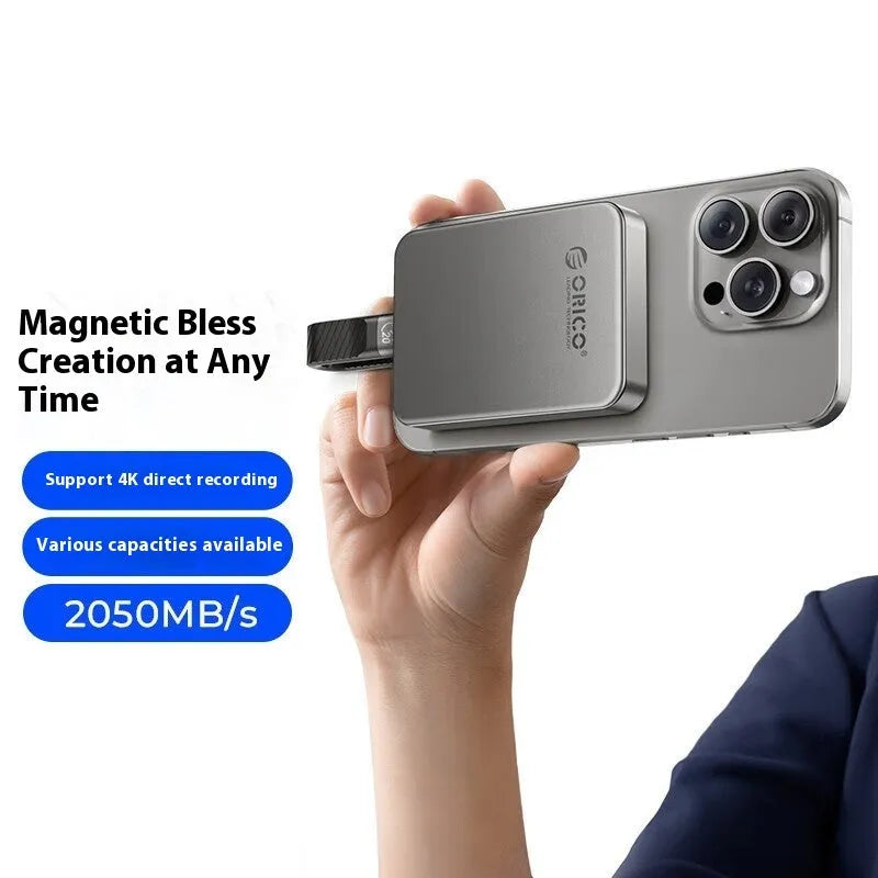 Grey magnetic mobile SSD portable hard drive with ultra-thin design and magnetic suction ring