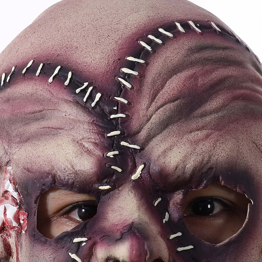 Halloween three-sided grimace horror mask in natural latex showing realistic facial effect
