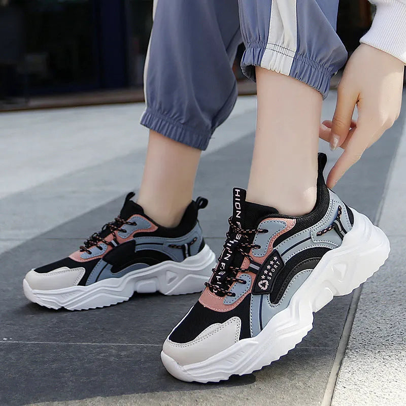 White women's casual sports shoes with mesh upper, thick PU sole, and lace closure.