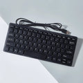USB wired mini keyboard in black, white, pink or blue with 280x125mm dimensions
