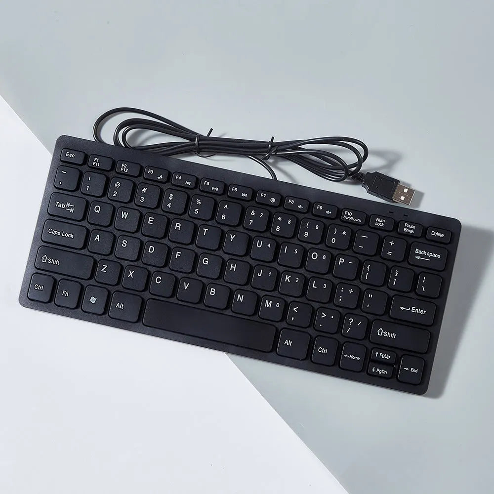 USB wired mini keyboard in black, white, pink or blue with 280x125mm dimensions