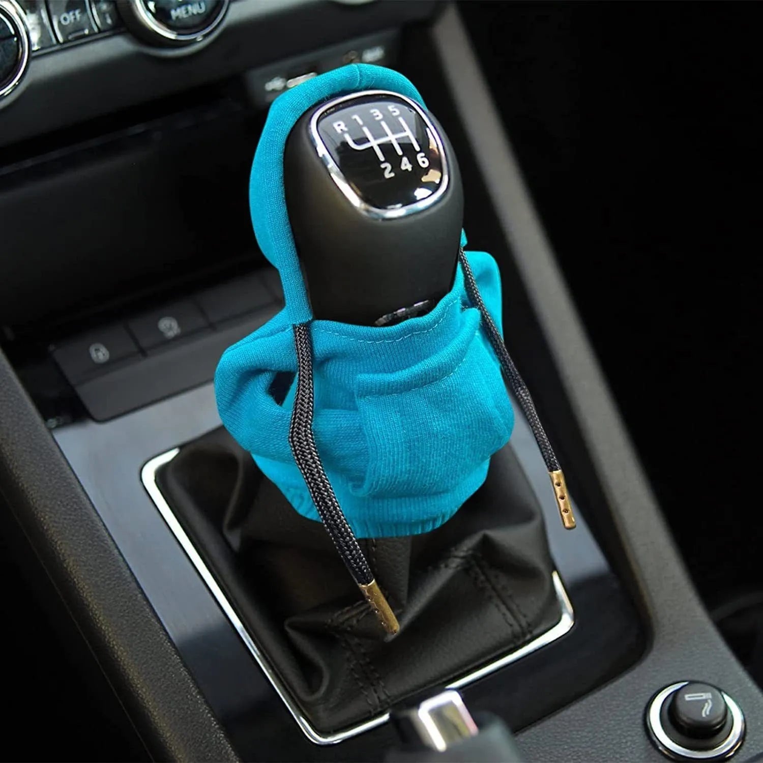 Cloth car gear shift knob hoodie cover in assorted colours next to a tape measure showing 13cm by 8cm dimensions.
